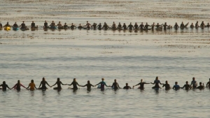 Students Paddle Out